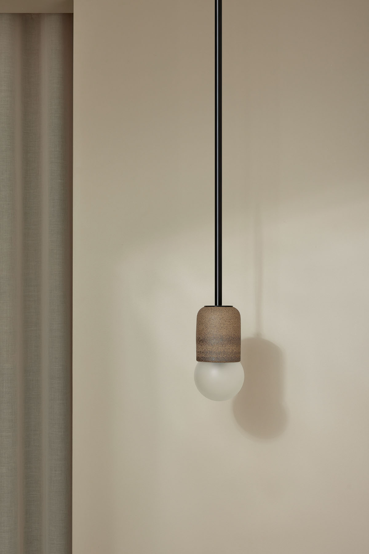 Terra 1 Pendant Light - Solid Rod Clay, Brushed Black